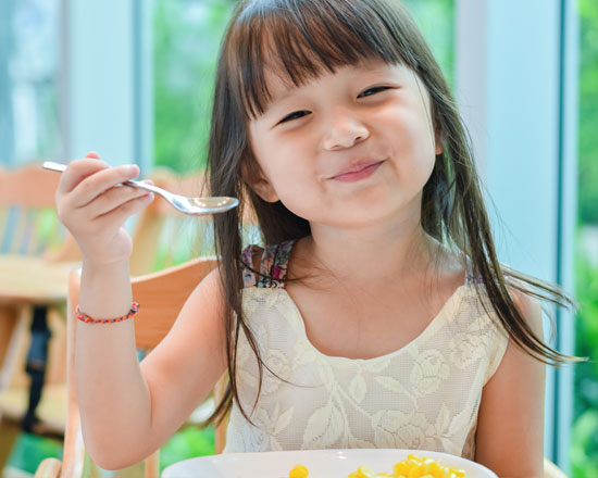 Heathcare Assistance/Health Navigators 2 Child eating