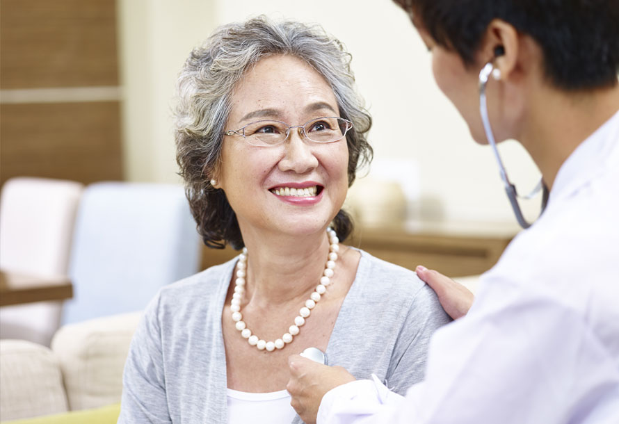 Older woman having annual health checkup