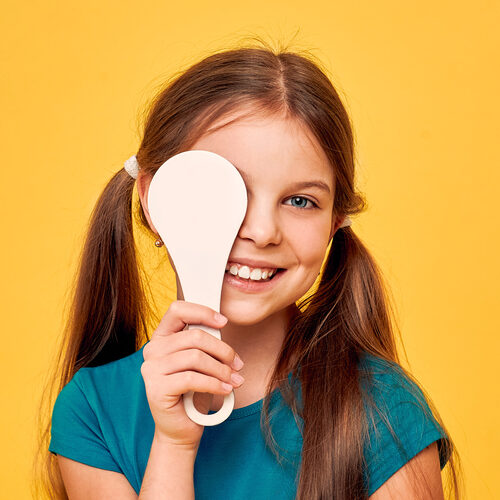 girl taking eye exam